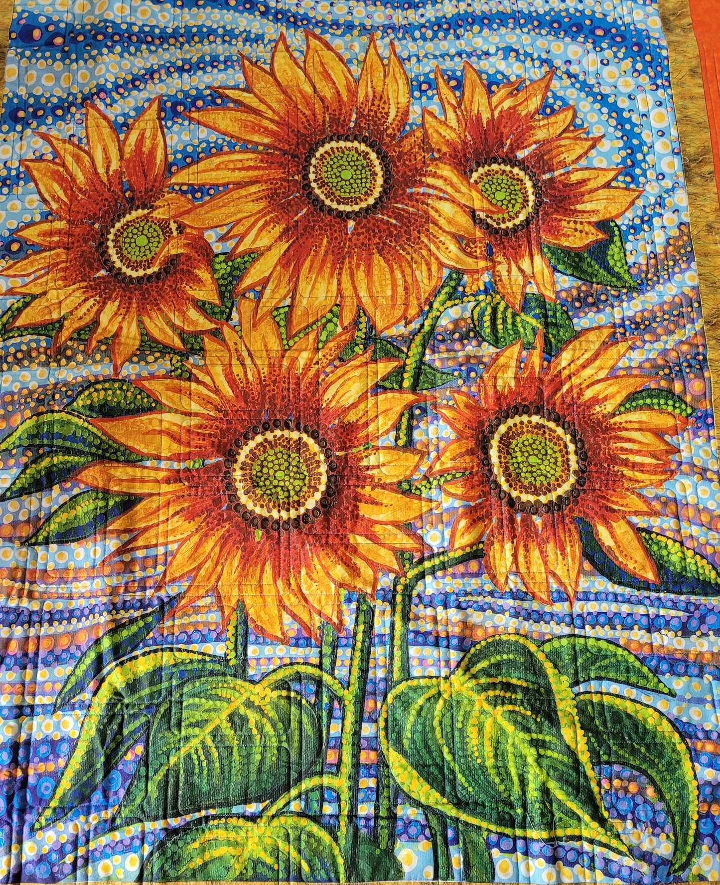 Contemporary Handmade Sunflower / Floral Lap Quilt, Wall Hanging, Bright Orange and Yellow Sunflowers bordered in Blue approx 46 x 60 inches