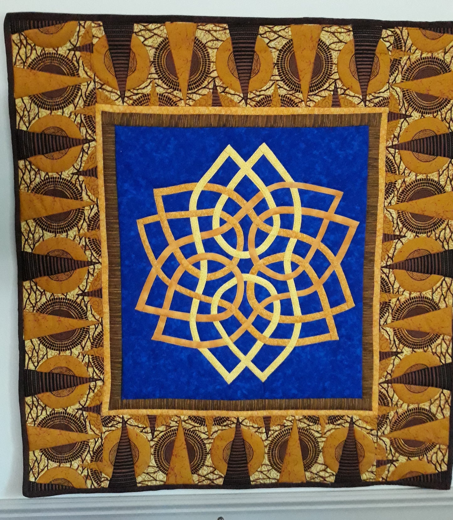 Interlacing Celtic Knot Quilt Wall Hanging, approx 30 x 30 inches, golds and royal blue