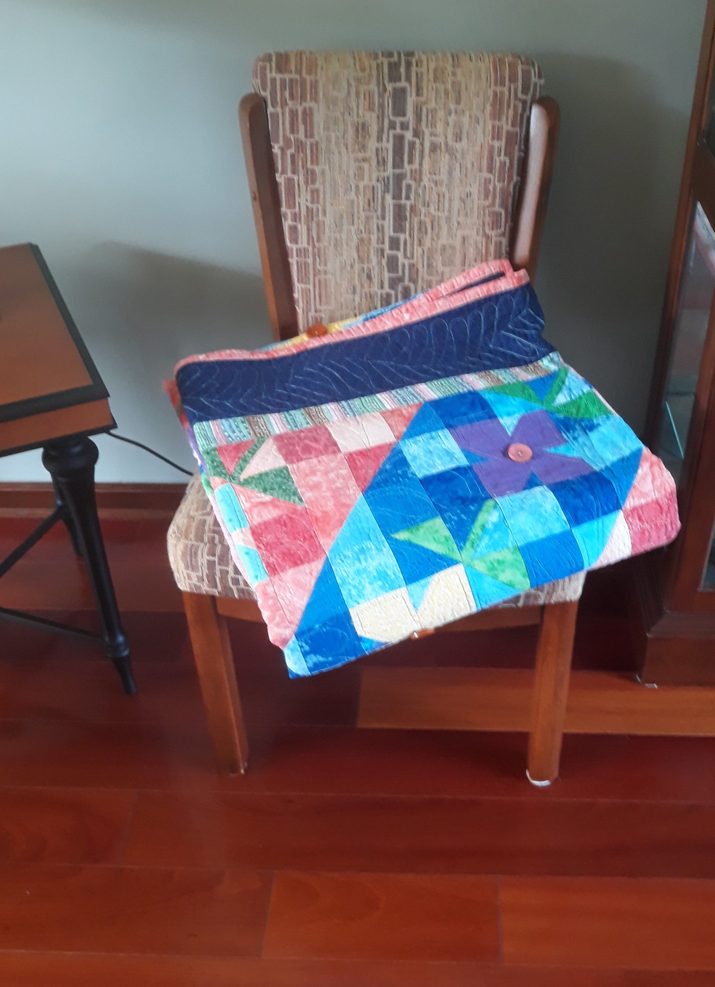 WindBlown Blossoms Quilt 64 x 80 inches, Blue and Coral, two sided quilt, handmade, geometric with colored flowers wooden button centers