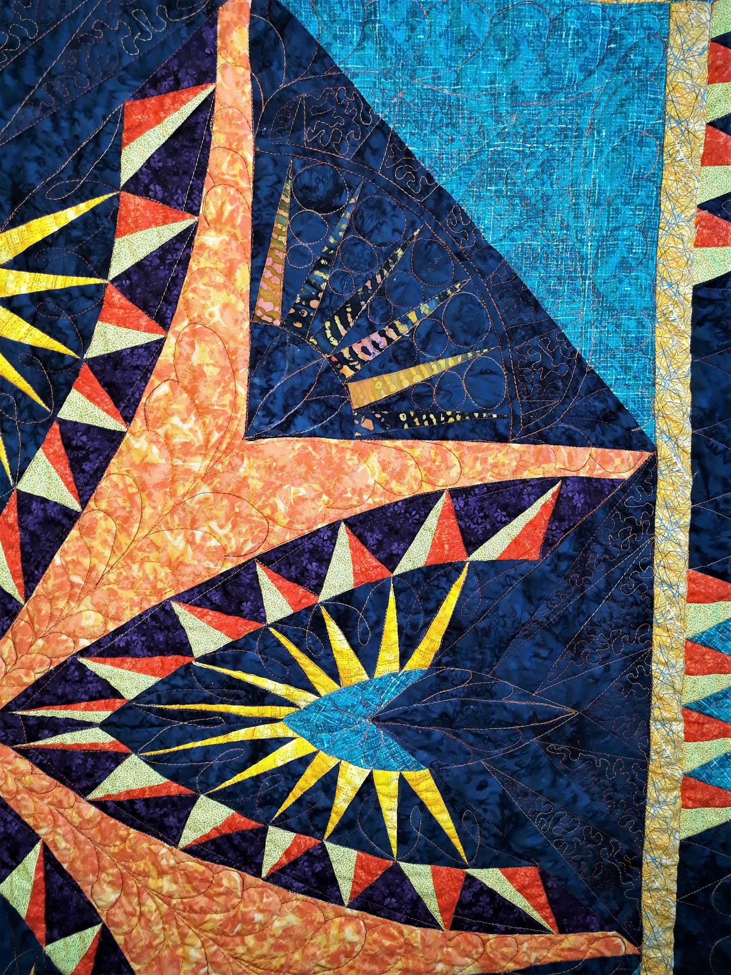 A Spikey Spike Medallion Small Quilt or Wall Hanging, 42 x 42 inches, Bold colors, Geometric design with extensive quilting, teal orange blue yellow