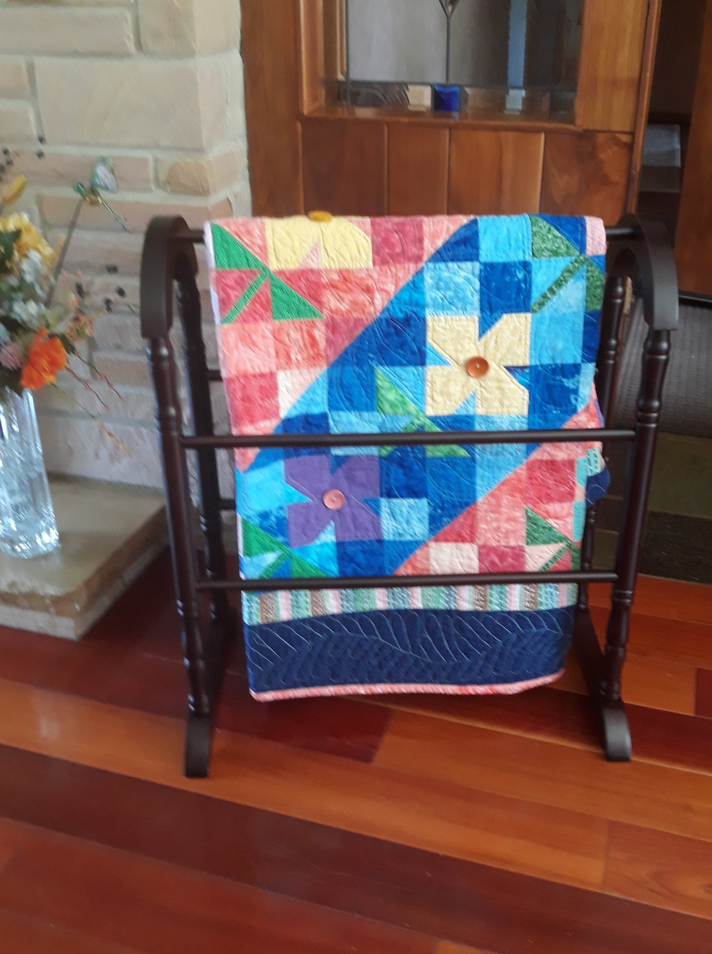 WindBlown Blossoms Quilt 64 x 80 inches, Blue and Coral, two sided quilt, handmade, geometric with colored flowers wooden button centers