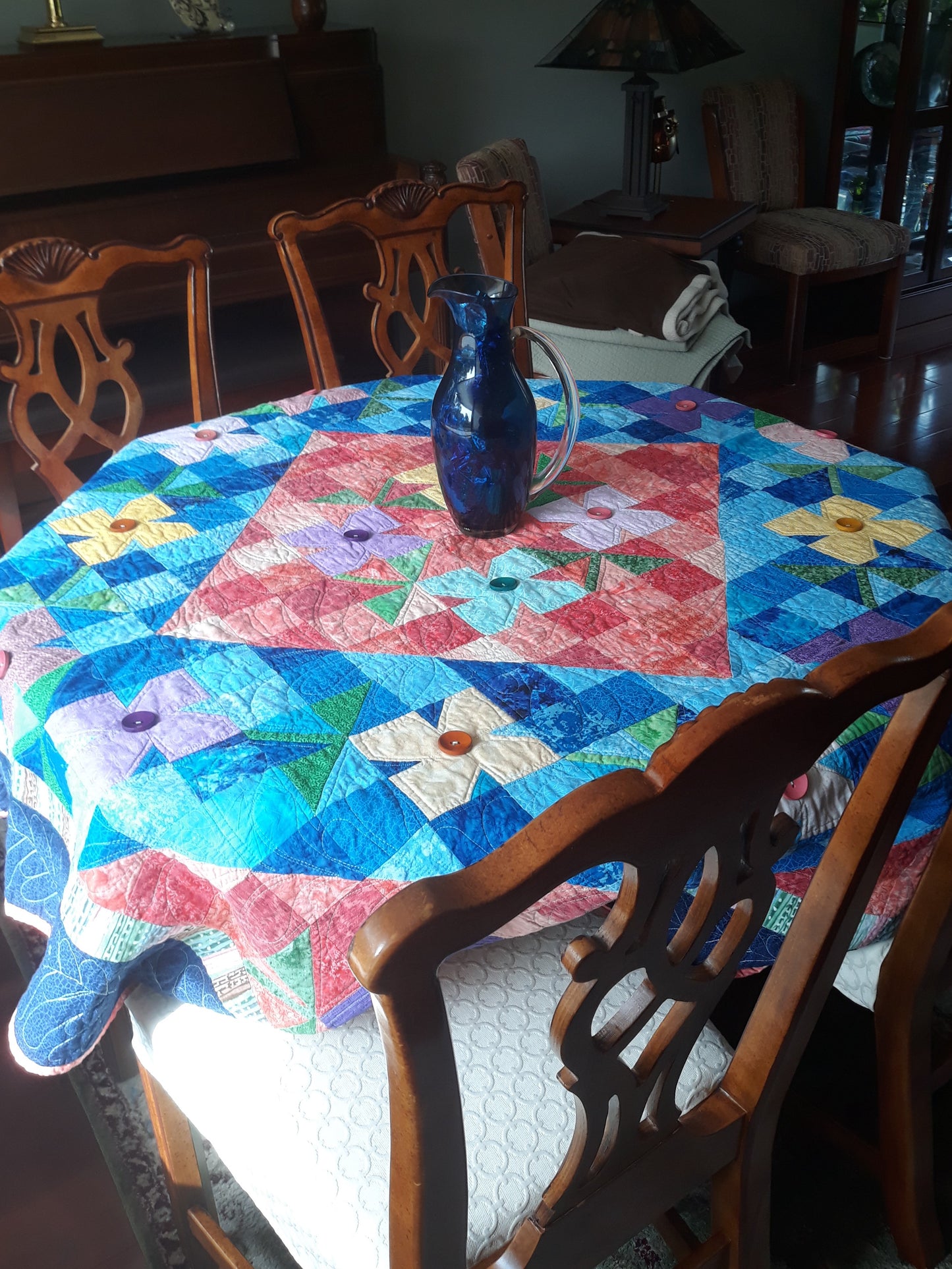 WindBlown Blossoms Quilt 64 x 80 inches, Blue and Coral, two sided quilt, handmade, geometric with colored flowers wooden button centers