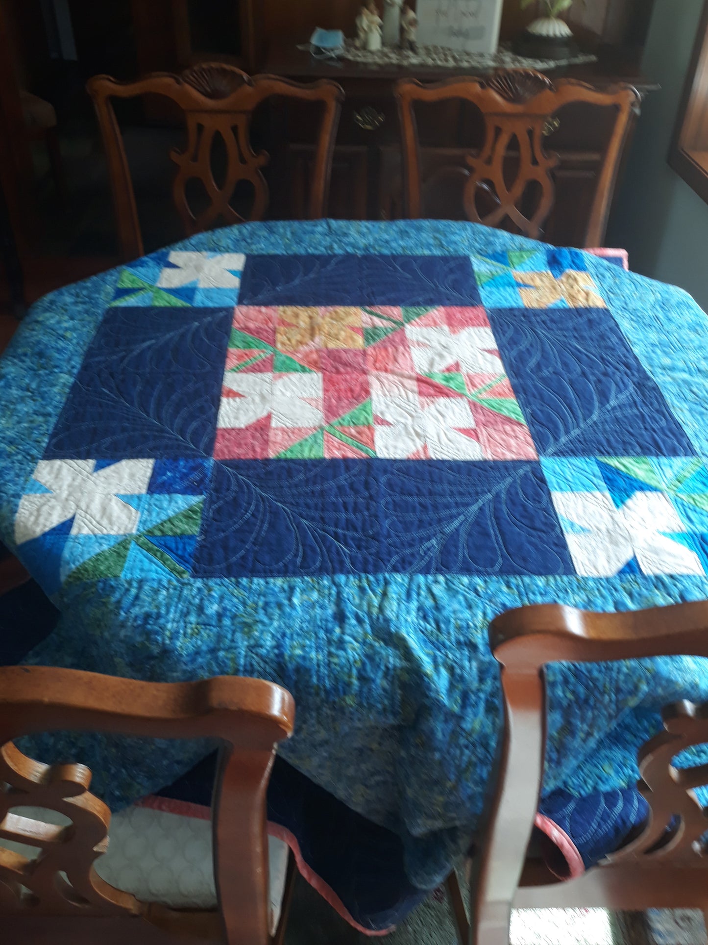 WindBlown Blossoms Quilt 64 x 80 inches, Blue and Coral, two sided quilt, handmade, geometric with colored flowers wooden button centers