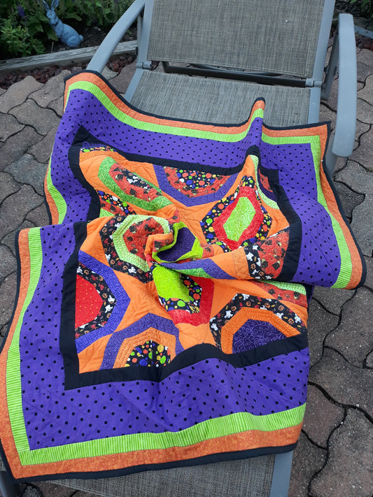 Halloween Fabric Octagon Lap Quilt or Wall hanging, 40 x 48 inches, orange, black, lime green, purple